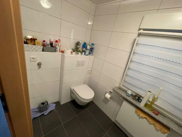 Wohn- und Geschäftshaus mit Ladenfläche, Nebengebäude, Garagen&Ausbaupotenzial in Nordkirchen-VHB – Bad Erdgeschoss