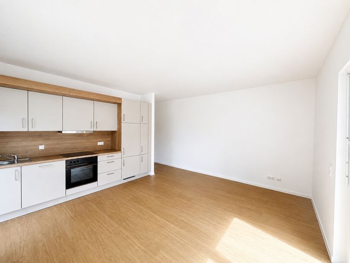 Erstbezug im Neubau! Moderne 1-Zimmer Wohnung mit QNG-Plus Siegel und Einbauküche! – Wohnbereich