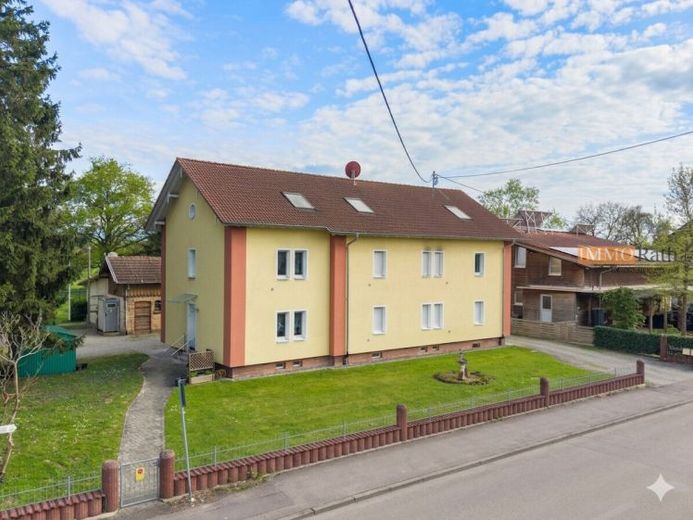 IMMORath.de - Charmantes Wohnen wie im Reihenendhaus mit eigenem Garten und zwei Stellplätzen – Foto 1