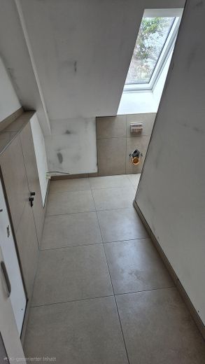 Erstbezug nach Dachausbau – moderne 2-Zimmer-Wohnung mit Effizienzklasse A – Badezimmer