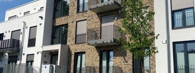 New build after first occupancy bright 1-room apartment KfW 40+, fitted kitchen, balcony – Hauseingang