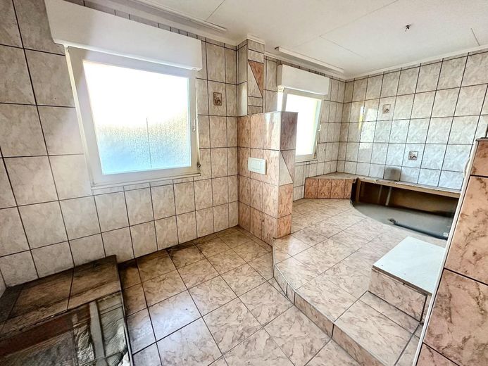 Winkelbungalow - großes Grundstück - Zentral in Giesen – Badezimmer