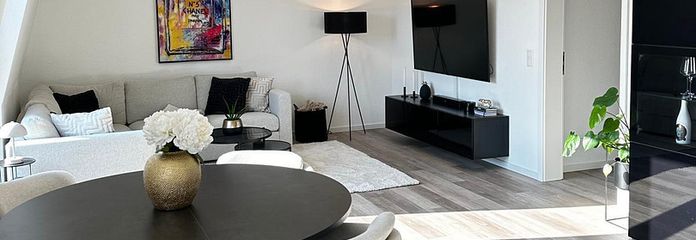 Modern 3-room apartment with 2 bathrooms and underground parking space – Wohn/Esszimmer