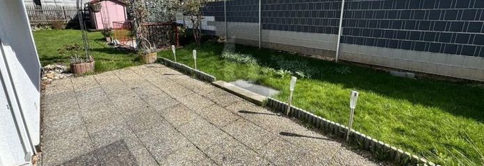WOHNEN MIT TERRASSE UND GARTENBEREICH