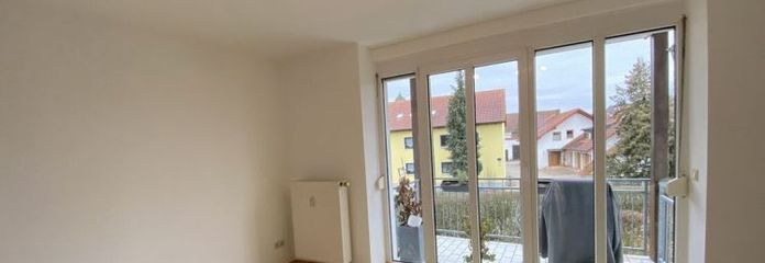 Charming 3-room apartment with south-facing balcony and two parking spaces