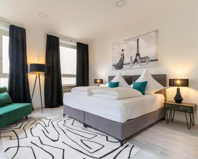 Apartment Schwebebahn – Großzügiges Wohnen mit Terrasse & Altbau-Charme – Schlafzimmer