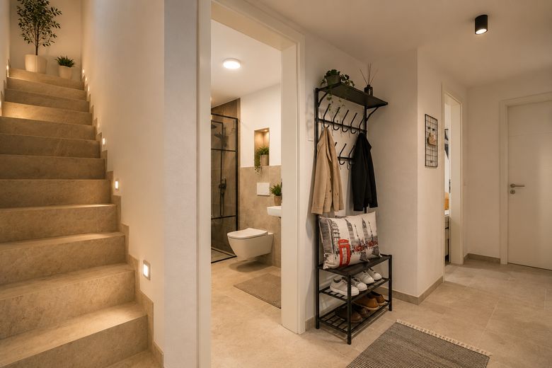 Modernes Wohnen auf 2 Ebenen – exklusive Maisonette mit Garten und Designküche – Foto 7