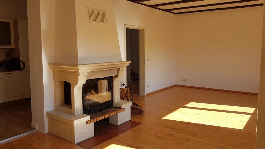 Wohnzimmer mit Kamin
