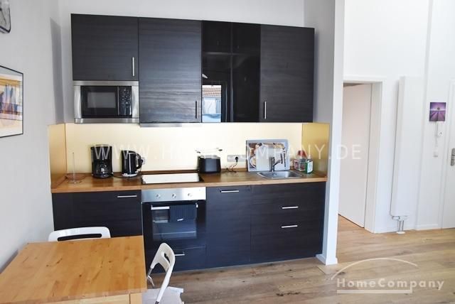 Zentrum, Modern möblierte DG-Wohnung mit Dachterrasse und offener Küche in zentraler aber ruhiger Lage – 1ba14ebae958d05e27b30720fd2eeaa5327afde0.jpg