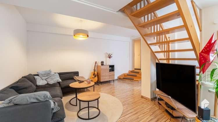 Großzügige Maisonettewohnung inkl. EBK mit Terrasse/Garten u. Balkon im Zentrum von Bad Belzig – Wohnzimmer (EG)