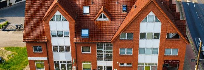 Renditestarkes Wohn- und Geschäftshaus mit 6 x Wohnung, 3 x Gewerbe und Tiefgarage am top-Standort nahe der Lesum