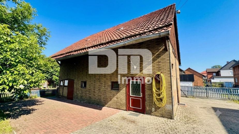 Charmantes Einfamilienhaus/Resthof mit viel Platz, modernisierter Technik und idyllischem Garten – Nebengebäude / Scheune Seitenansicht