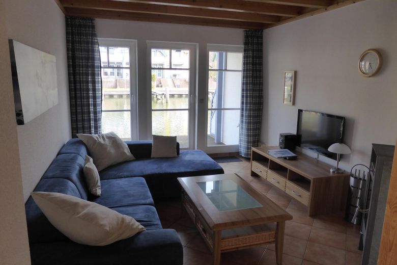 Ferienhaus mit eigenem Bootssteg im Hafendorf Rheinsberg – Wohnbereich