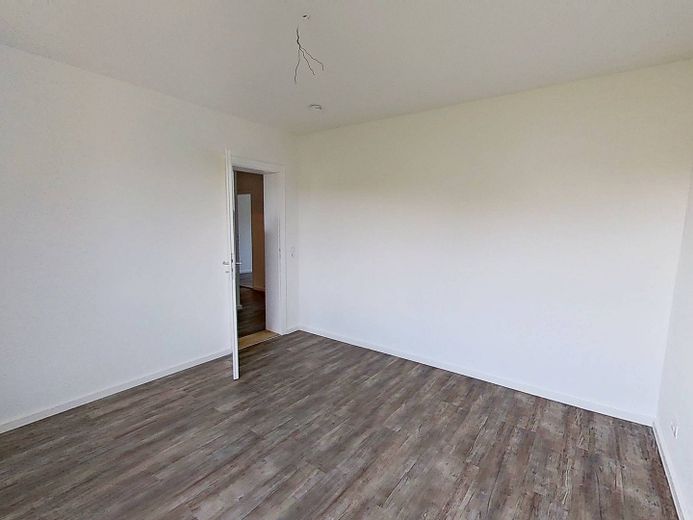 Schicke 3-Zimmer-Wohnung mit BALKON und EINBAUKÜCHE – Ansicht II: Schlafzimmer I