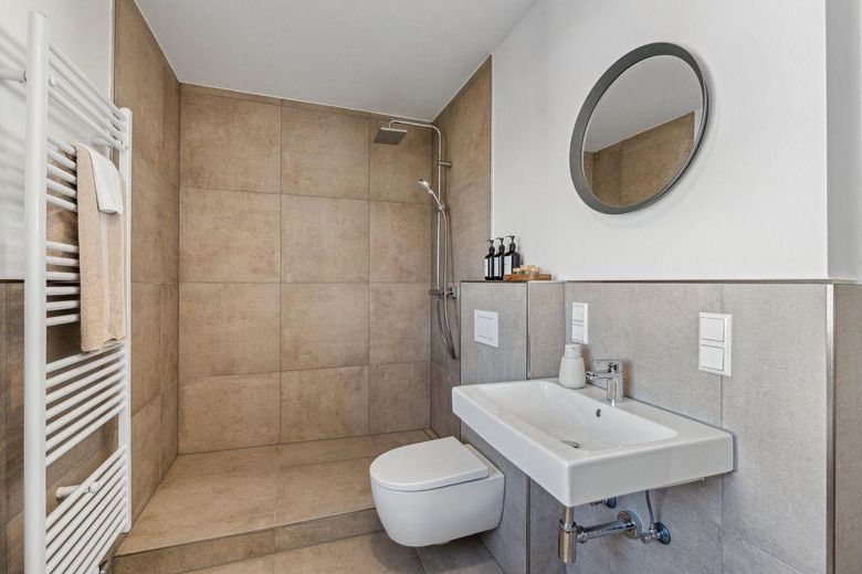 Heller Bungalow mit Südterrasse – Komfortables Wohnen auf einer Ebene - provisionsfrei – Badezimmer mit Dusche