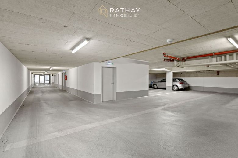 Stadtnah wohnen mit Komfort: 2-Zimmer-Erdgeschosswohnung mit Südterrasse &amp; Tiefgarage – Tiefgarage