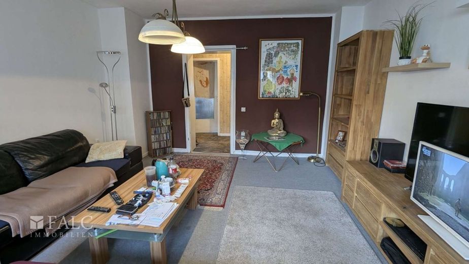 Helles Single‑Apartment mit guter Rendite – Wohnzimmer