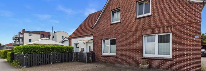 Wiefelstede | Faktor 16: Mehrfamilienhaus mit 3-Einheiten & Carport