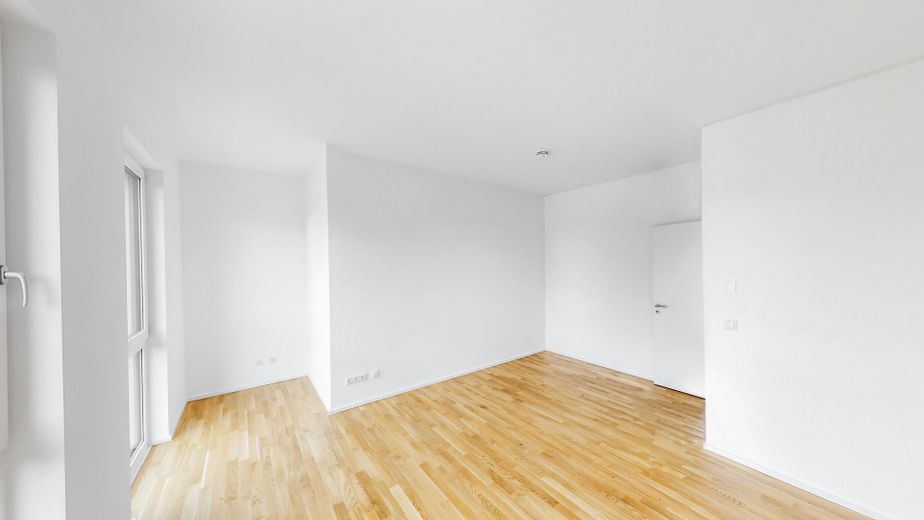 Modernes Wohnambiente: 3-Zimmer-Neubau mit Balkon in Basdorf (A1 WE06) – Beispielbild Zimmer