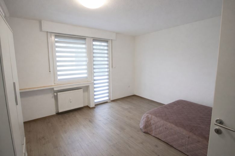 Schlafzimmer mit Balkon