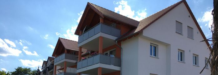 Appartement moderne de 3 pièces avec prestations haut de gamme, balcon et deux carports – Objektansicht