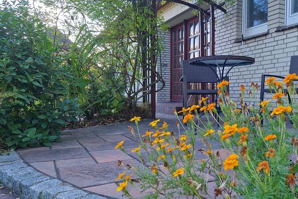 Two-family house – quiet and central with a garden paradise