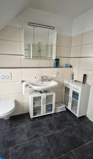 Two-family house – quiet and central with a garden paradise – OG Bad