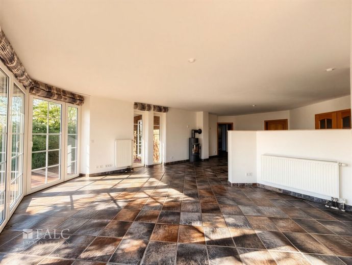 Exklusiv. Außergewöhnlich wohnen. Ein Haus für mehrere Generationen. – EG-Wohnzimmer- Bild 1