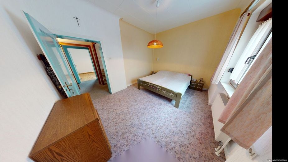 Gepflegtes Zweifamilienhaus in ruhiger Nebenstraße von Püttlingen – Schlafzimmer 1 Erdgeschoss