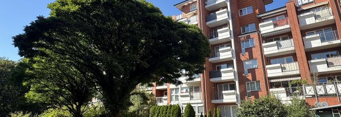 Modern & zentral: Helle Terrassen-Wohnung in Glinde mit neuer Küche und edlem Boden – Außenansicht zur Terrasse