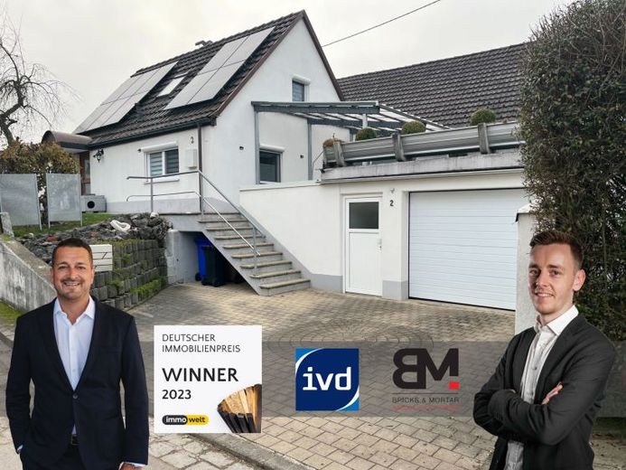 Gepflegtes Einfamilienhaus mit moderner Ausstattung und Terrasse in Holzheim – Photo 1