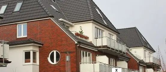 Vermietete 2-Zimmer-Wohnung mit Südbalkon & TG-Stellplatz in Top-Lage (Bj. 2001) – Wohnblock