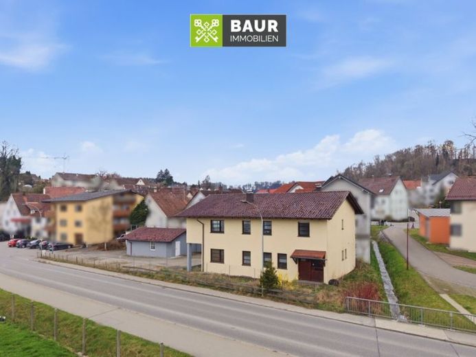 360° I Edificio residenziale e commerciale in posizione ottimamente collegata – con molteplici potenzialità di sviluppo – Foto 1