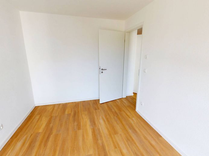 Oasi di benessere inondata di luce di 83 m²: moderno appartamento di 3 locali con balcone a Villingen – Ansicht I: Schlafzimmer II