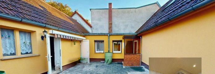 Ohne Käuferprovision - Einfamilienhaus mit Charakter und Gestaltungsspielraum – Innenhof & Garten