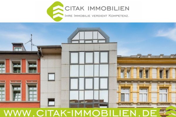 Aachen - Merkez'de çift garajlı ve zemin katta ek kullanım alanına sahip dubleks çatı katı dairesi
