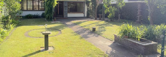 Gartenansicht Blick zum Haus