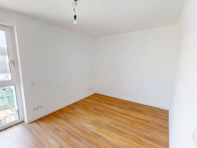 Modern wonen: lichtrijk nieuwbouwappartement met 3 kamers, balkon en inbouwkeuken – Ansicht I: Schlafzimmer I