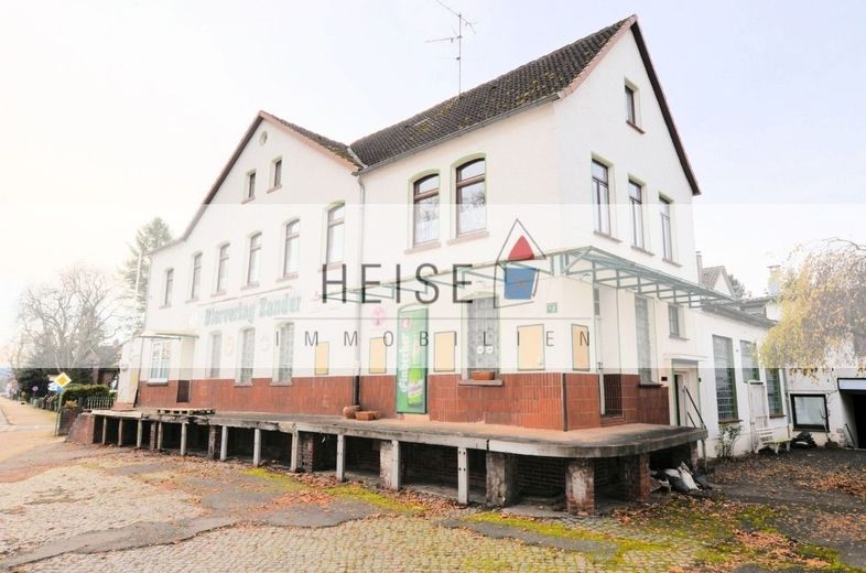 ** PREISREDUZIERUNG ** Wohn- und Geschäftshaus mit Gaststätte, Wohnung und Garagen in zentraler Lage – Wohn- und Geschäftshaus - Dassel - Heise Immobilien