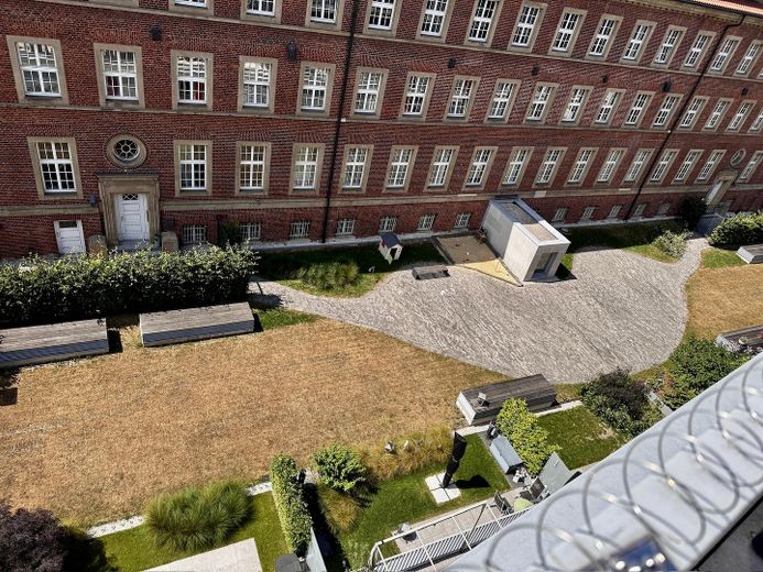 Penthouse met sauna, open haard, SmartHome, 2 TG-plaatsen direct bij het St. Franziskus-hospital – Gemeinsam genutzter Innenhof