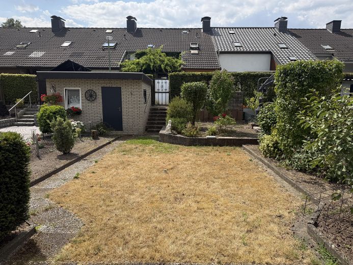 Familienidyll mit Wintergarten in der Dodesheide – Garten