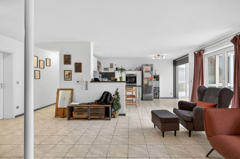 Freiwerdend: Moderne Wohnung mit Balkon und TG in zentraler Lage – Wohnbereich