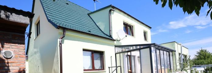 Kröpelin: Gepflegtes Einfamilienhaus mit vermieteter Einliegerwohnung