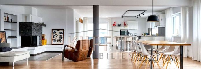 Elegante mansarda in stile loft con balcone e interni premium!