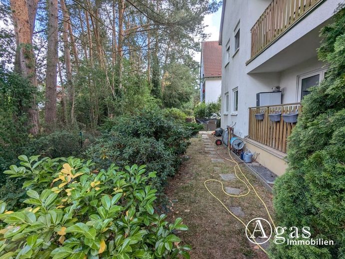 Vollvermietetes Mehrfamilienhaus mit 3 Wohneinheiten in Borkheide – hinter dem Haus