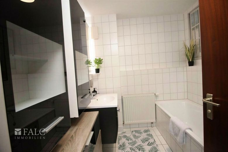 3,5 Zimmer Erdgeschosswohnung mit 2 TG-Stellplätzen in ruhiger Lage – Badezimmer