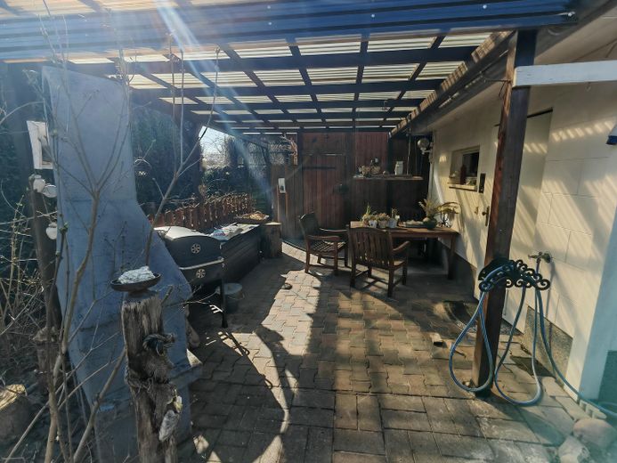 Grande casa unifamiliare a Wanzka – überdachte Terasse im EG