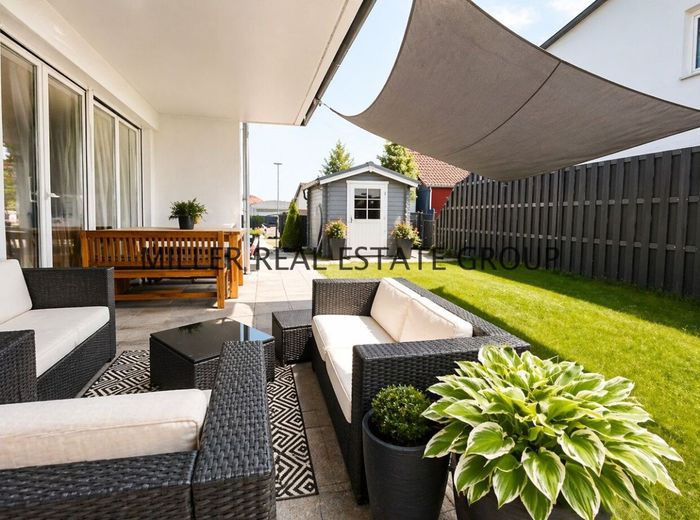 Moderne 4-Zimmer-Erdgeschosswohnung mit Privatgarten, Terrasse &amp; zwei Tiefgaragenstellplätzen! – Gartenbereich