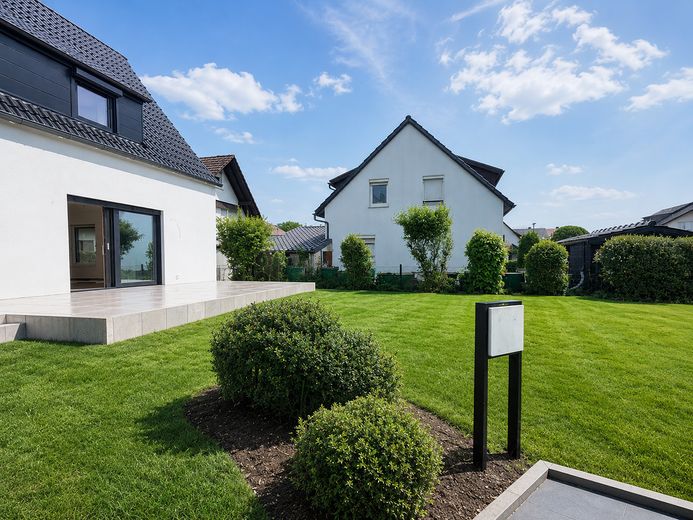 Sanierte ein Familienhaus – Garten