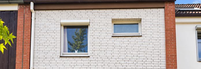 Reinbek'te bahçeli, garajlı ve bölgesel ısıtmalı sıra ev – 4 oda + dönüştürülmüş çatı katı – Frontansicht